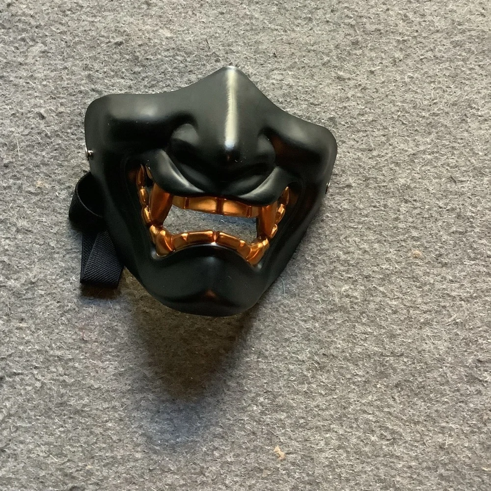 Black and Gold Mask with adjustable strap